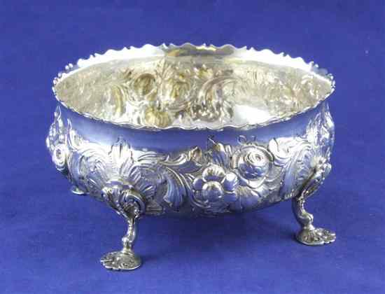 Appraisal: A Victorian silver sugar bowl of circular form embossed with