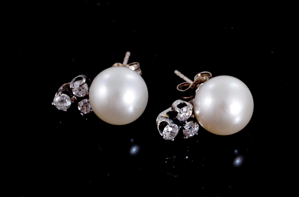 Appraisal: Pair pearl and diamond pierced earrings mm pearls accented by