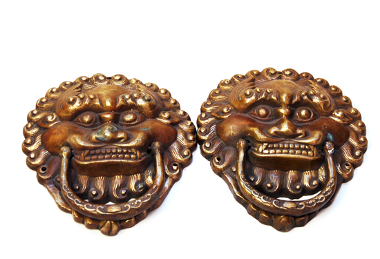 Appraisal: A Pair of Cast Brass Asian Furniture Pulls in the