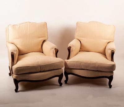 Appraisal: A pair of beech framed armchairs on carved legs with