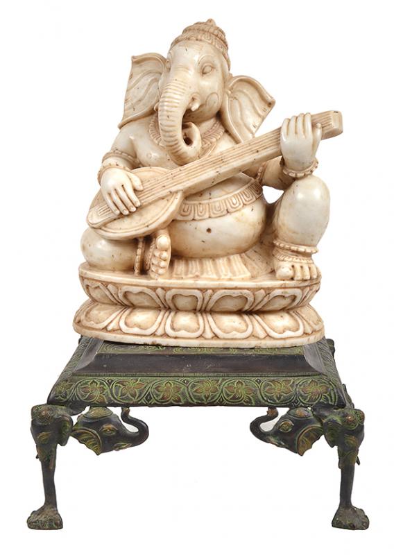 Appraisal: AN INDIAN MARBLE FIGURE OF GANESH WITH A CAST METAL