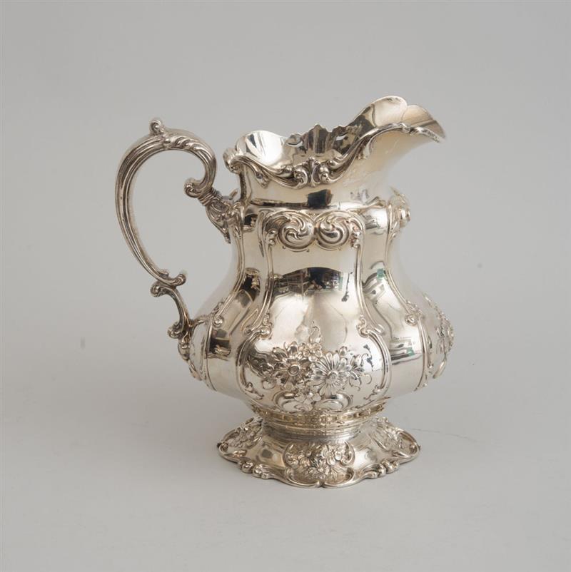 Appraisal: AMERICAN SILVER WATER FIVE-PINT PITCHER Marked with lion-headed dolphin and