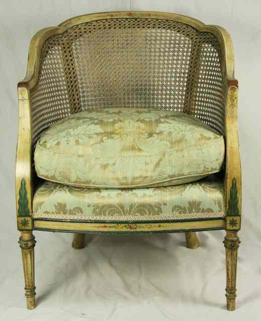 Appraisal: A French cane back chair with painted frame on tapered