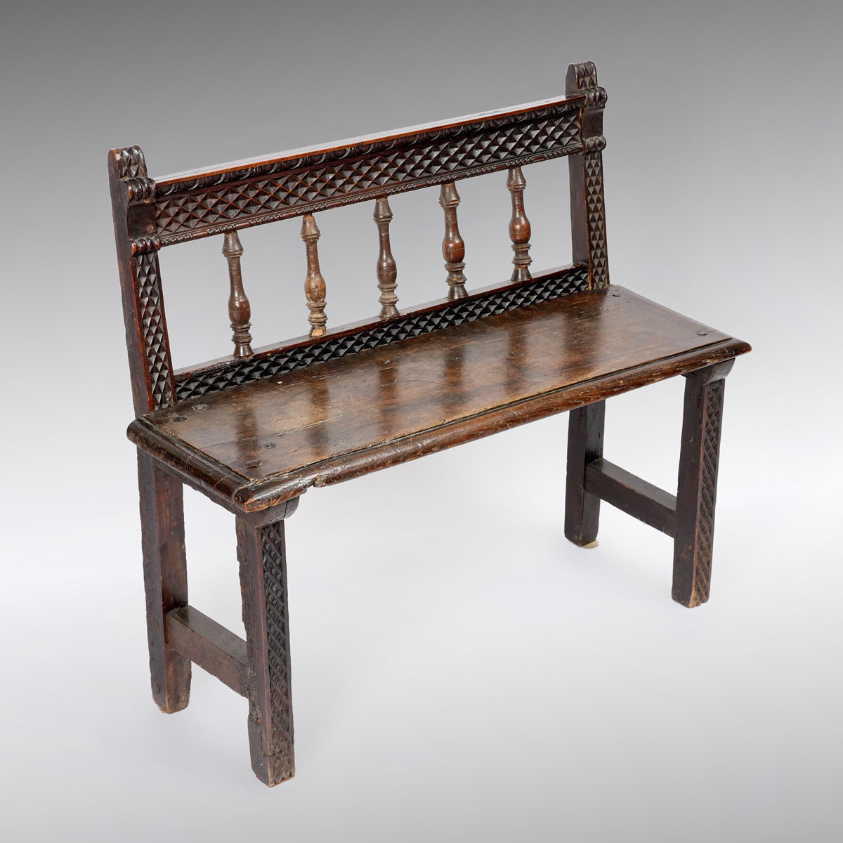 Appraisal: EARLY ENGLISH CARVED OAK BENCH English carved Oak bench having