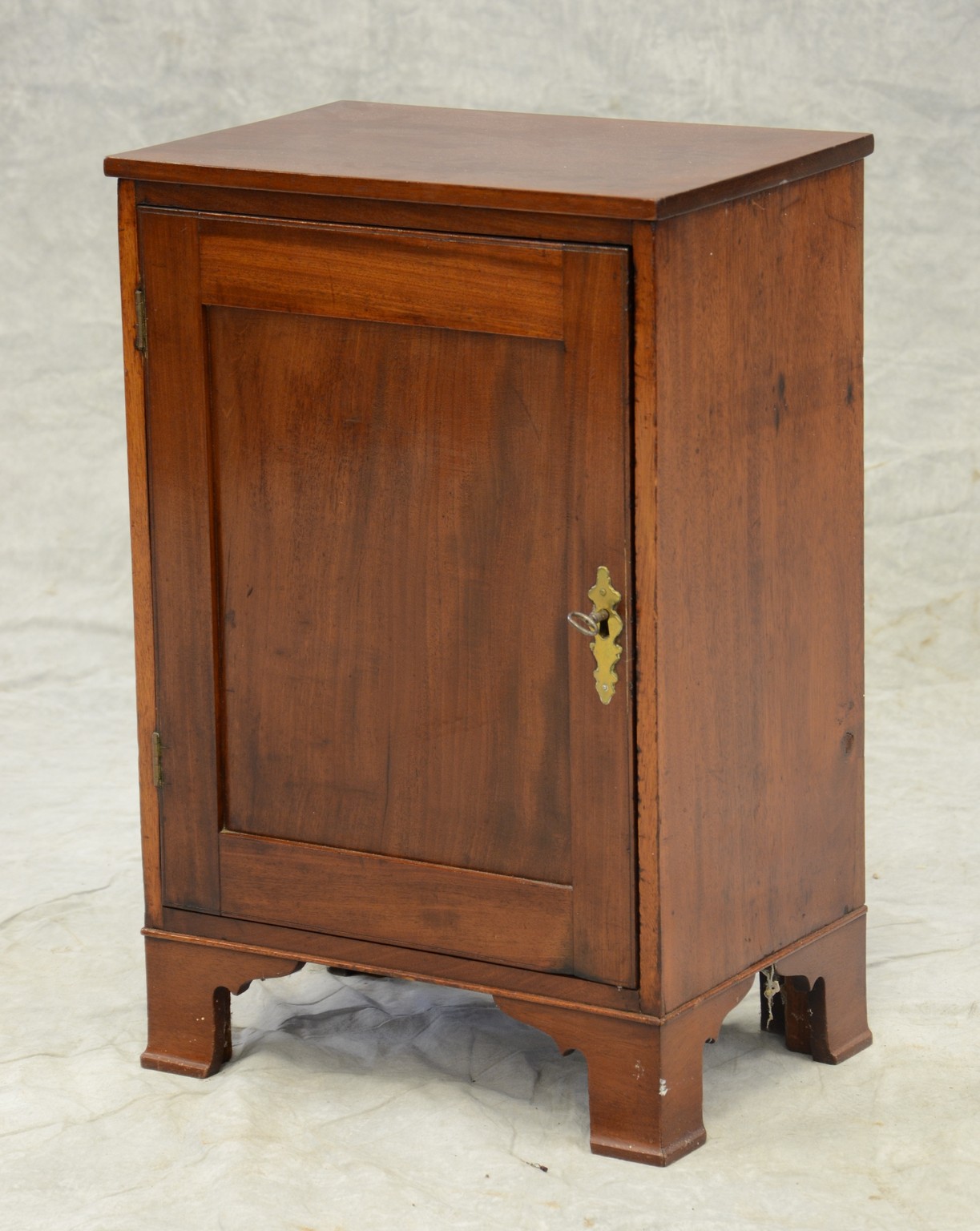 Appraisal: Mahogany single door spice cabinet interior with open cubbyholes and