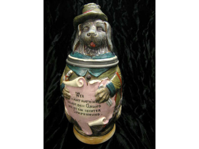 Appraisal: German Figural Pottery Stein of a Dog dressed as a