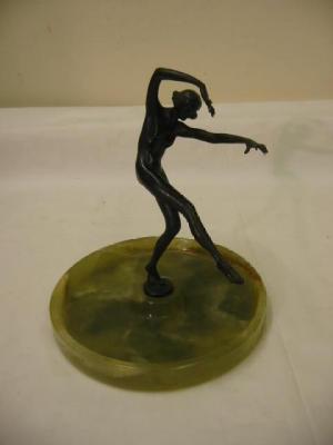 Appraisal: AN ART DECO SPELTER FIGURAL DISH modelled as a female