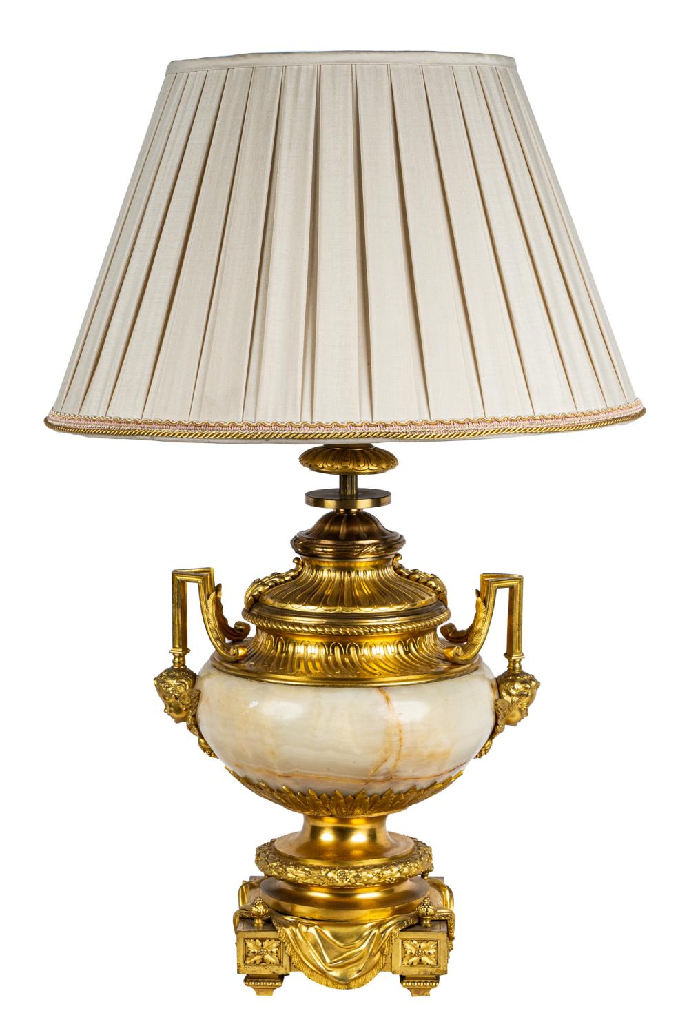 Appraisal: FRENCH ORMOLU-MOUNTED ONYX URNmounted as a lamp with a single