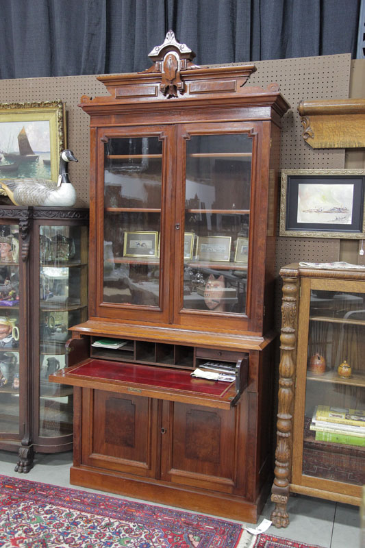 Appraisal: VICTORIAN STEPBACK CUPBOARD Walnut having a carved and incised crest