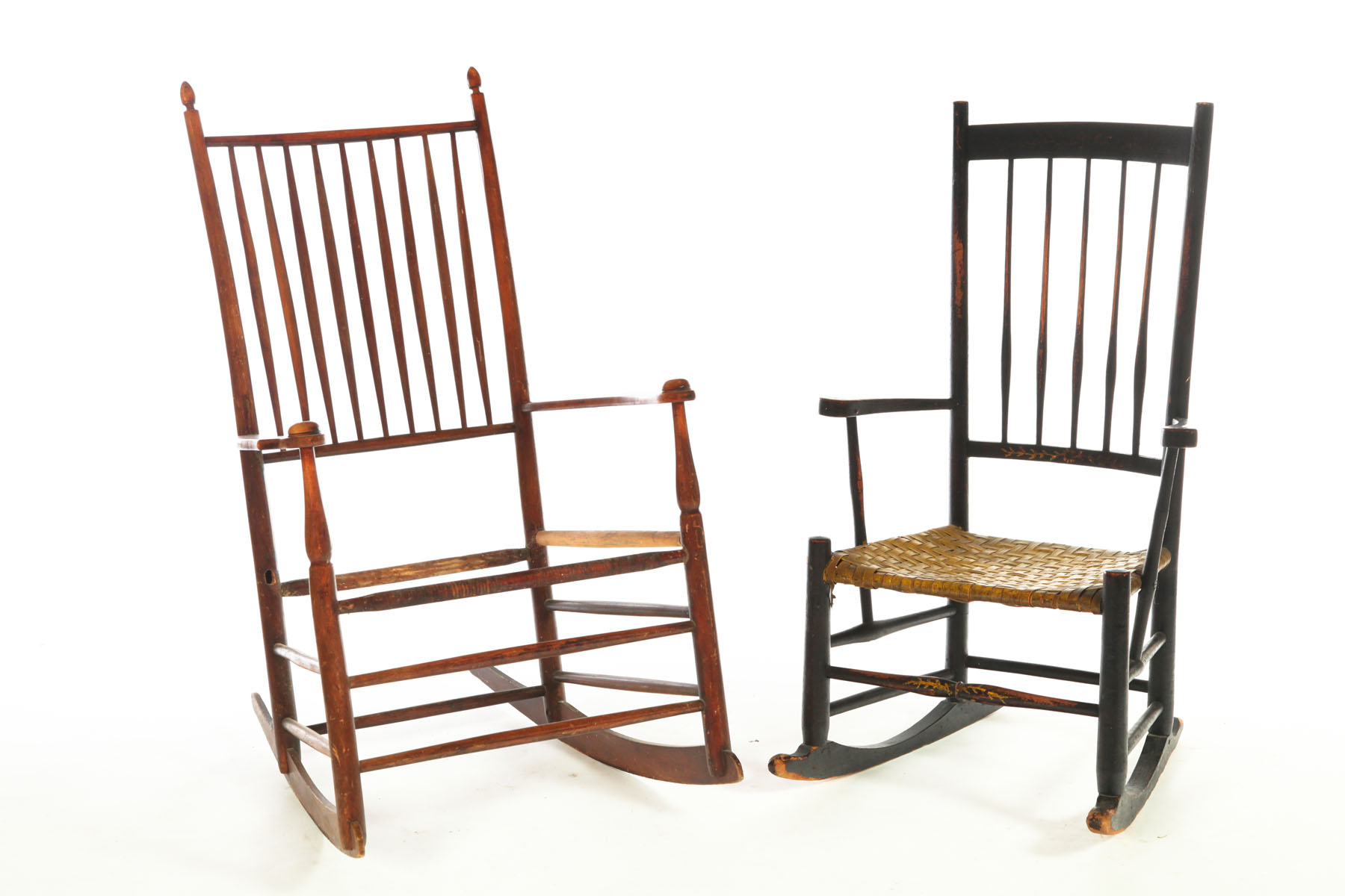 Appraisal: TWO ROCKING CHAIRS Both American th century mixed woods Includes