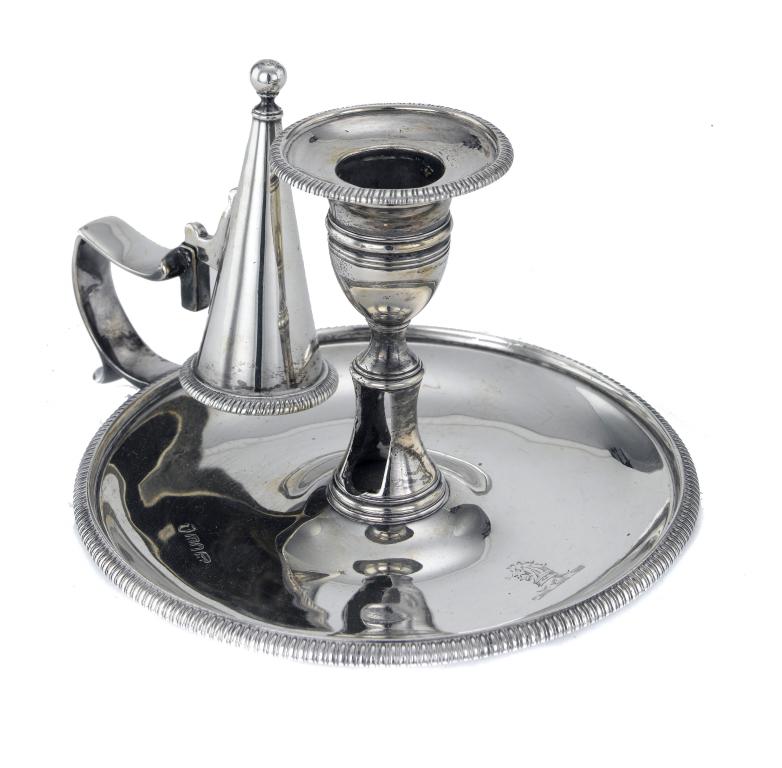 Appraisal: A GEORGE III CHAMBERSTICK with nozzle and conical extinguisher in