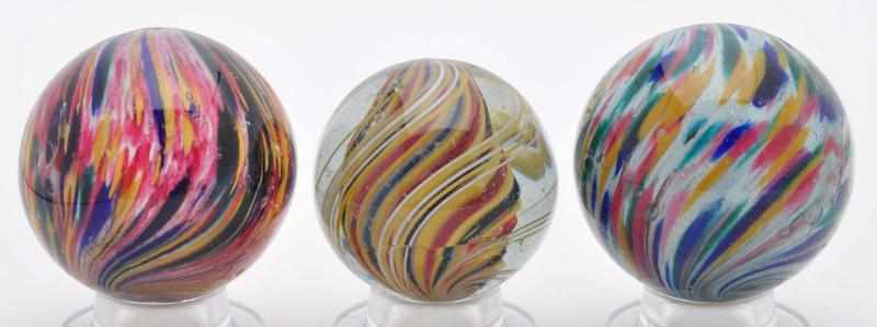 Appraisal: Lot of Handmade Marbles Description This lot includes two multicolor