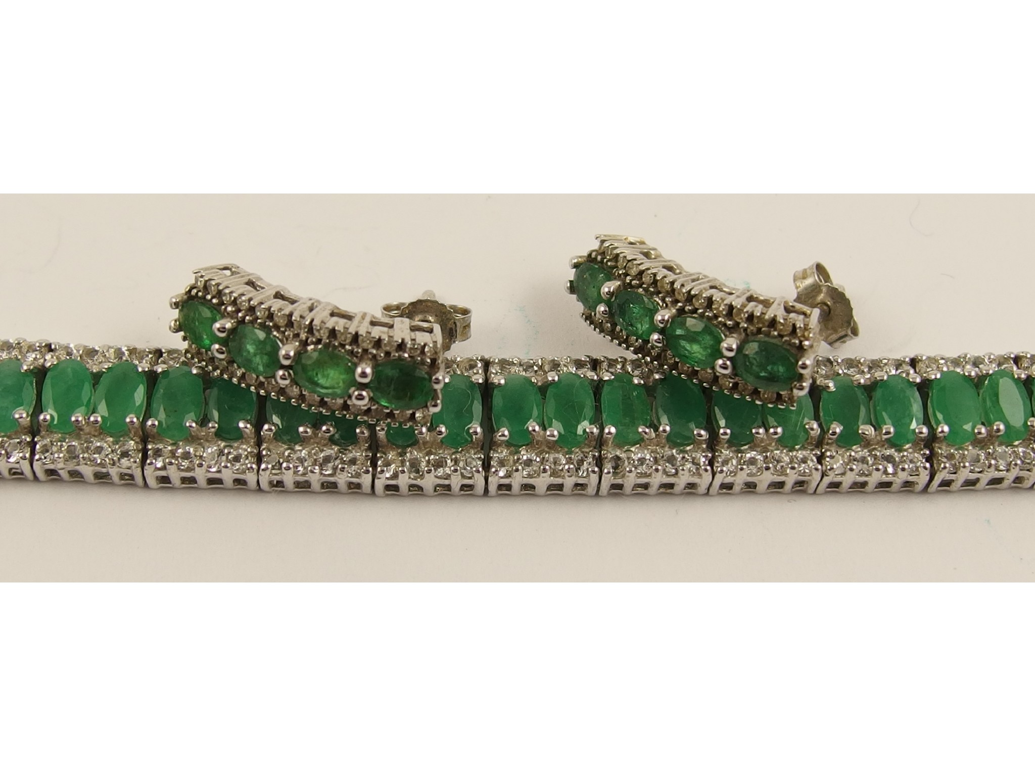 Appraisal: A pair of diamond and emerald earrings together with a