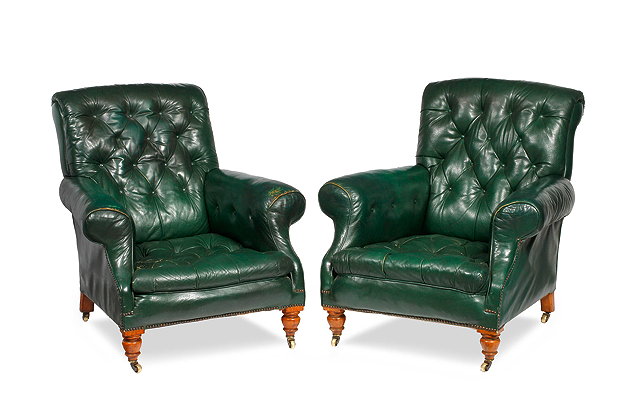 Appraisal: A PAIR OF VICTORIAN GREEN LEATHER BUTTON UPHOLSTERED CLUB ARMCHAIRS