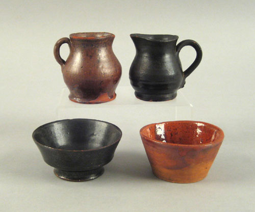 Appraisal: Two miniature glazed redware pitchers th c h together with