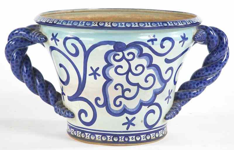 Appraisal: Gustavsberg Jardinereearthenware with tin glaze and cobalt bold twist handles