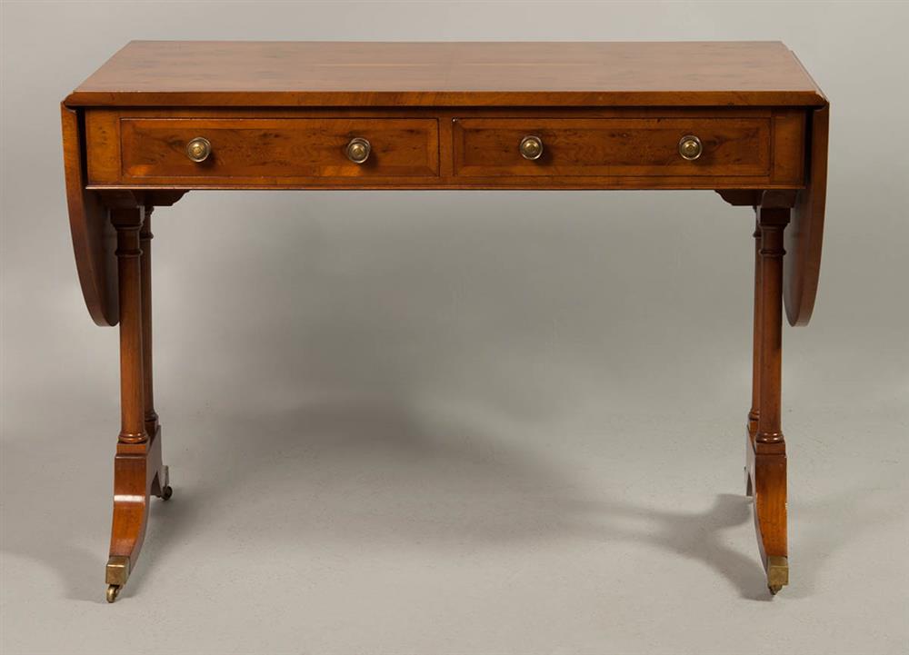 Appraisal: REGENCY STYLE MAHOGANY SOFA TABLE rectangular top with oval drop