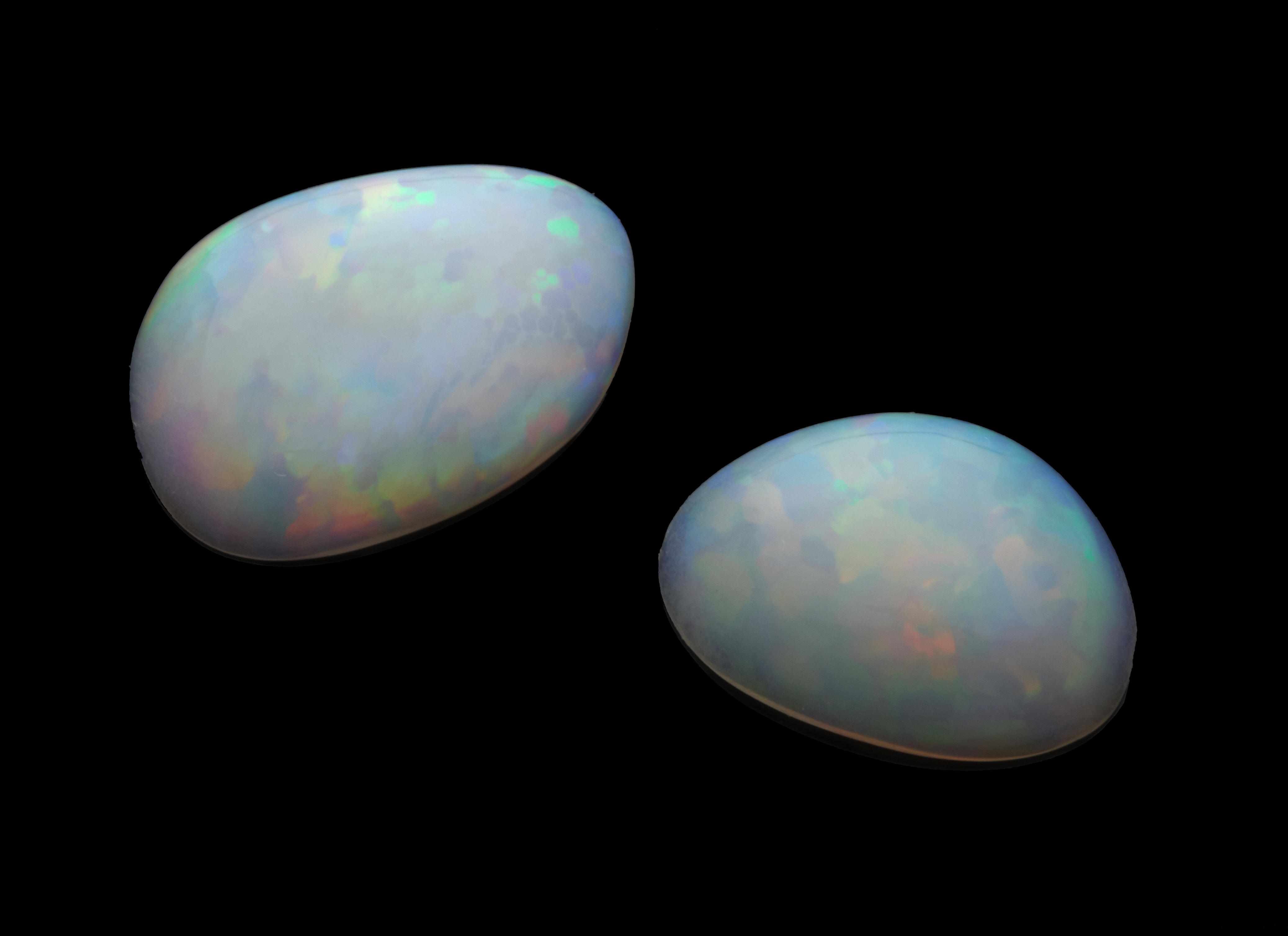 Appraisal: Two White Opals Wello Ethiopia Two fine free-form opals one