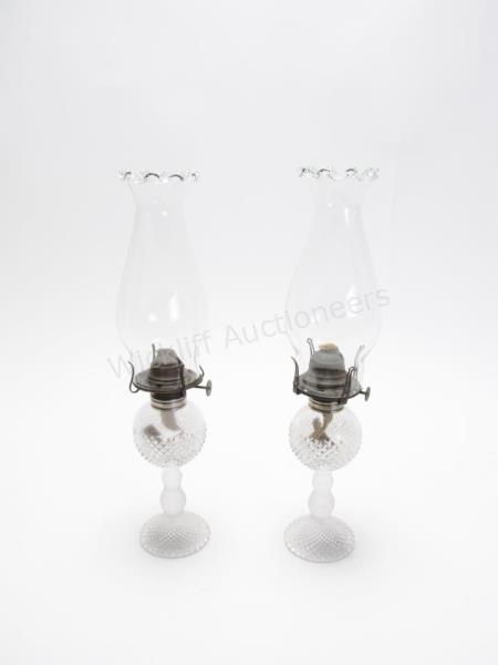 Appraisal: Pair of Cambridge Oil Lamps diamond pattern cut glass bases