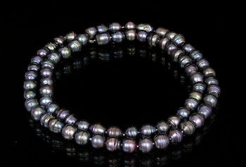 Appraisal: A Long Strand of Baroque Pearls Designed by Evanoff A