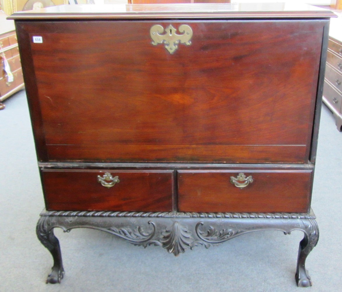 Appraisal: An th century Irish mahogany chest on stand with rectangular