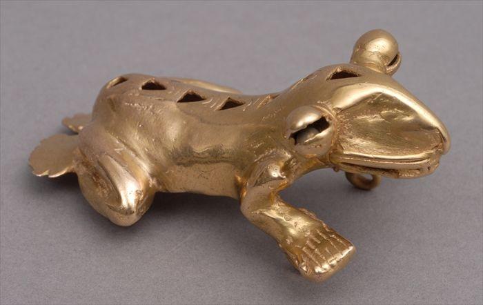 Appraisal: PRE-COLUMBIAN-STYLE GOLD ZOOMORPHIC PENDANT Modeled as a frog-like figure with