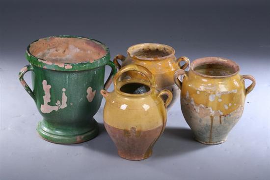 Appraisal: THREE FRENCH PROVINCIAL GLAZED TERRACOTTA URNS AND A JUG late