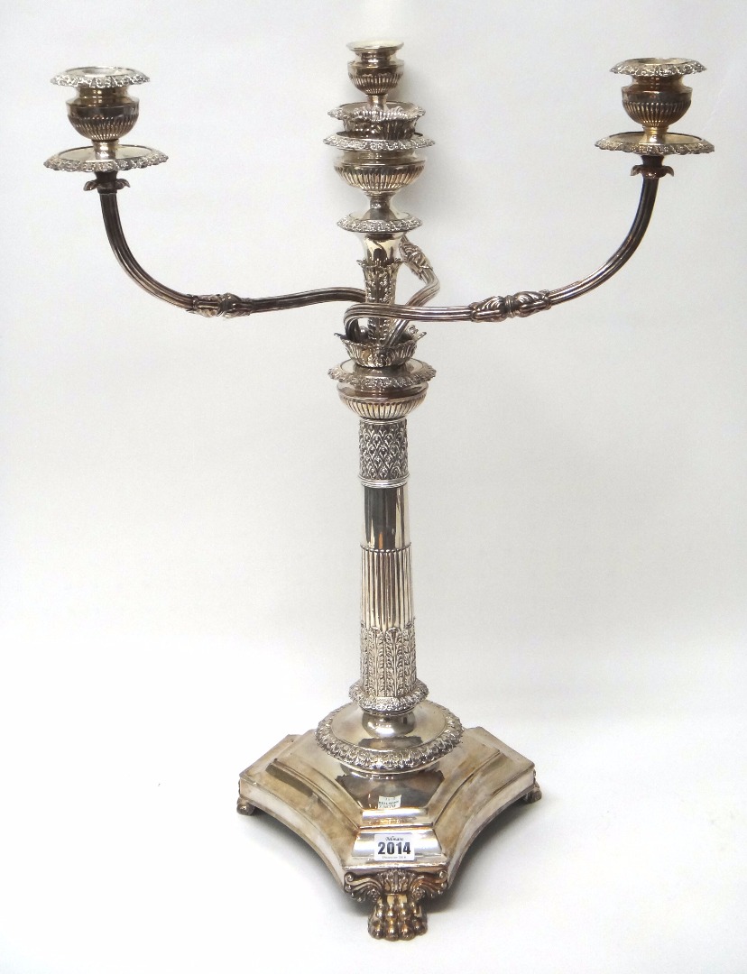 Appraisal: A silver plated French Empire style four light table candelabra