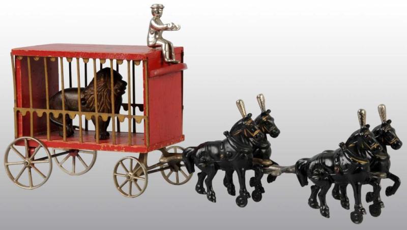 Appraisal: Cast Iron Wood Arcade -Horse Circus Wagon Toy Description Includes