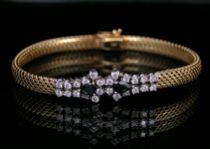 Appraisal: A Sapphire Diamond Bracelet K yellow gold flex band set