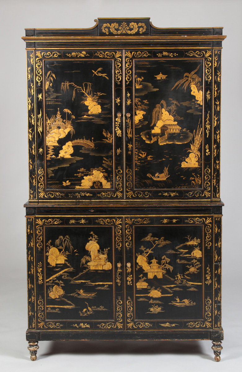 Appraisal: EARLY VICTORIAN BLACK JAPANNED AND PARCEL-GILT CABINET The painted rectangular