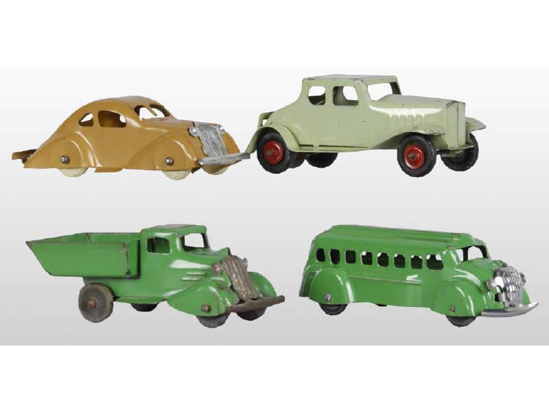 Appraisal: Lot of Pressed Steel Wyandotte Toys Description Two cars one