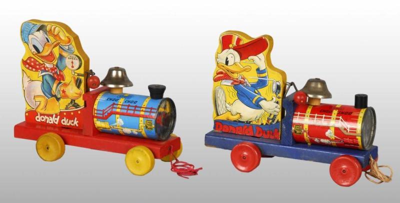 Appraisal: Lot of Fisher Price Donald Duck Train Toys Description American