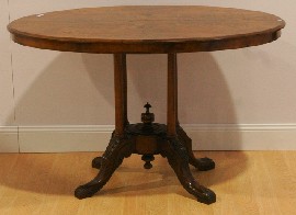 Appraisal: A Victorian walnut and inlaid oval centre table cm long