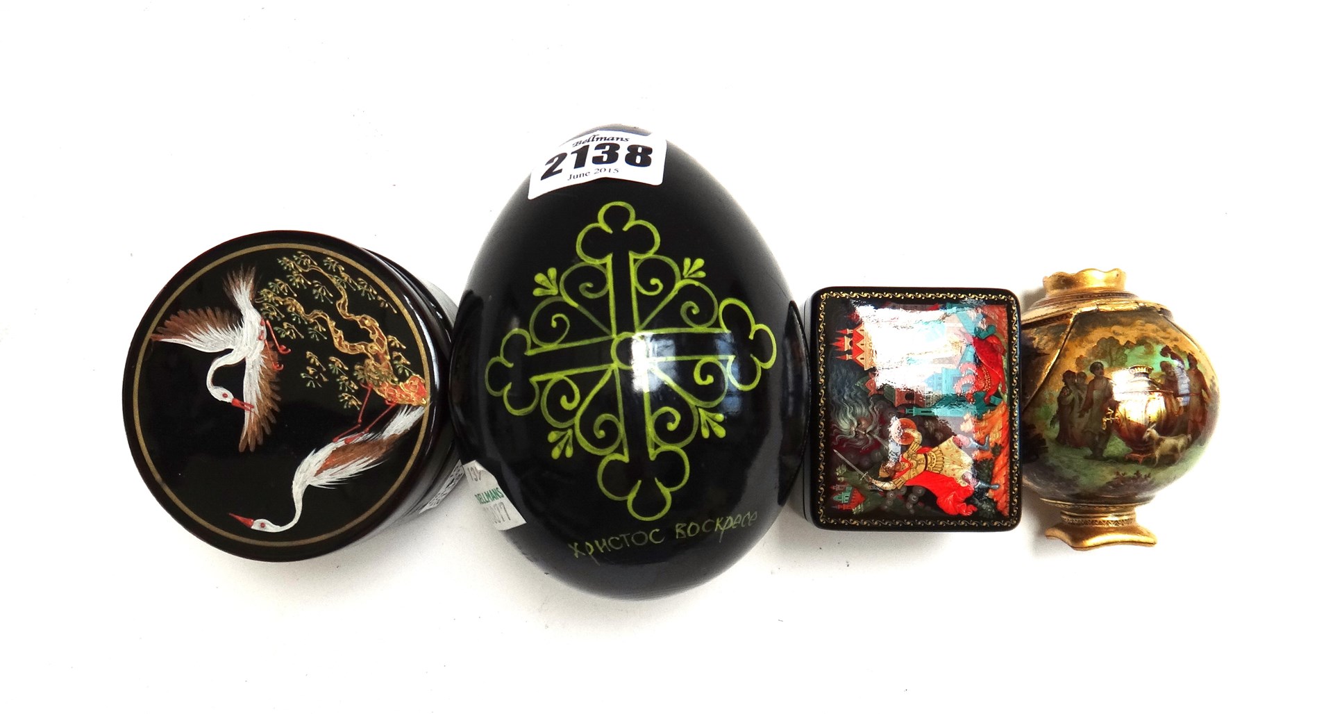 Appraisal: A Russian lacquered papier mache egg decorated with 'The Holy