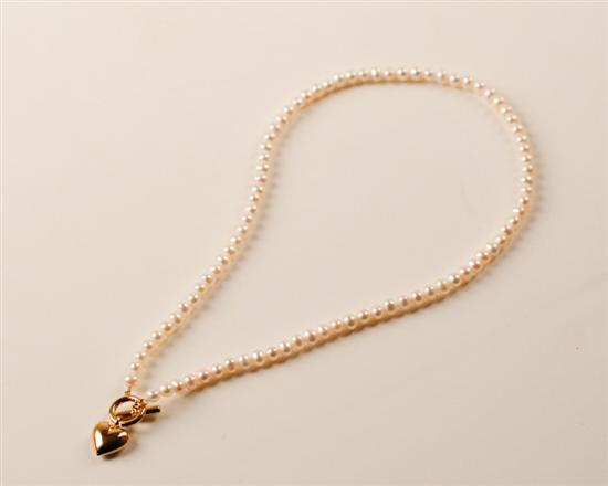 Appraisal: A Cultured Freshwater Pearl Necklace long having a K marked