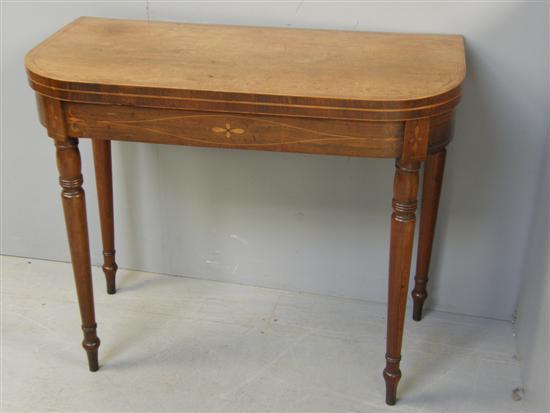 Appraisal: th century rosewood and parquetry inlaid card table on turned