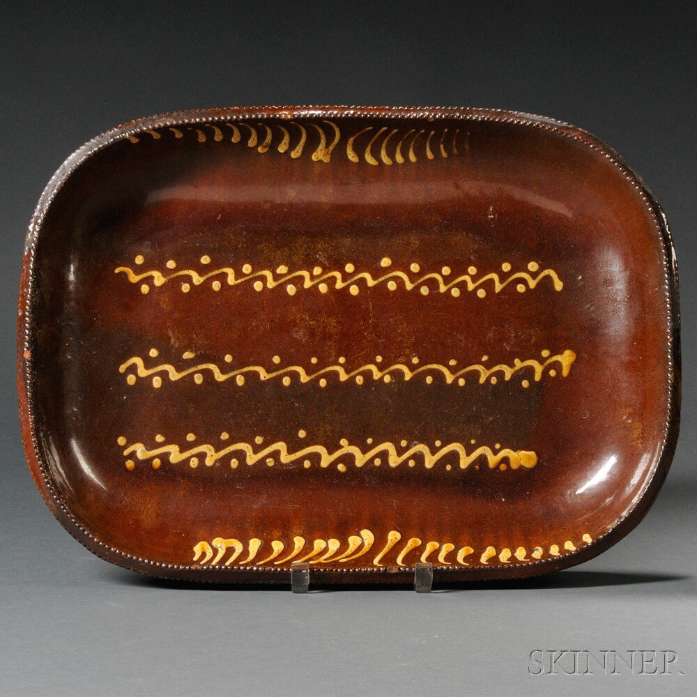 Appraisal: Large Slip-decorated Redware Loaf Dish early th century oblong form