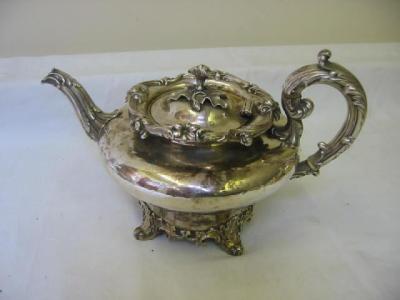 Appraisal: A WILLIAM IV TEAPOT of pumpkin form with flower finial