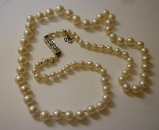 Appraisal: A CULTURED PEARL NECKLACE the graduated pearls having white gold