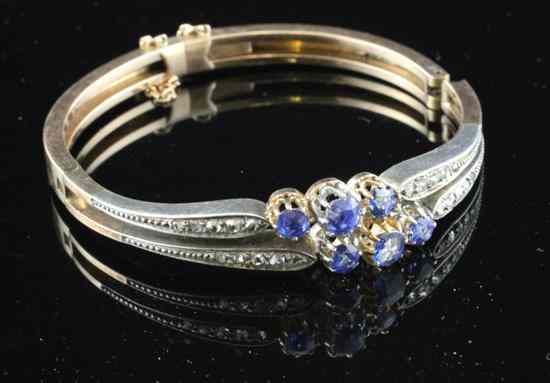 Appraisal: A gold sapphire and diamond bracelet with six graduated sapphires