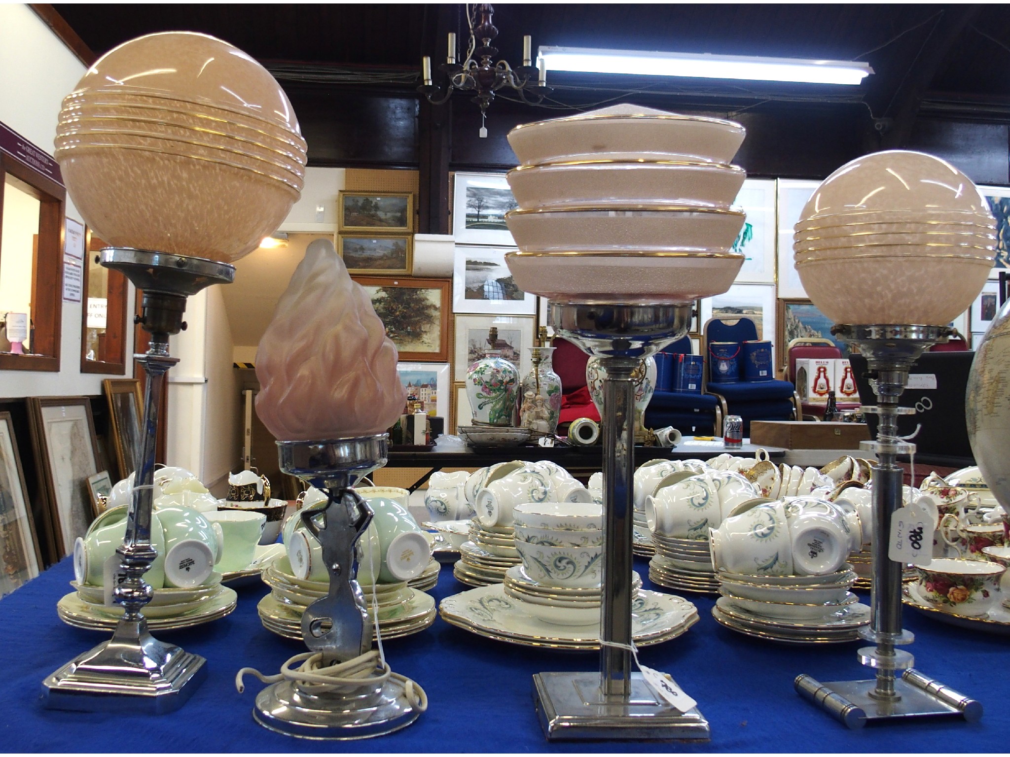 Appraisal: Four Art Deco chrome and glass table lamps