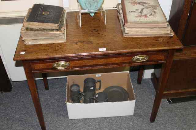 Appraisal: A GEORGIAN OAK SIDE TABLE fitted with single frieze drawer