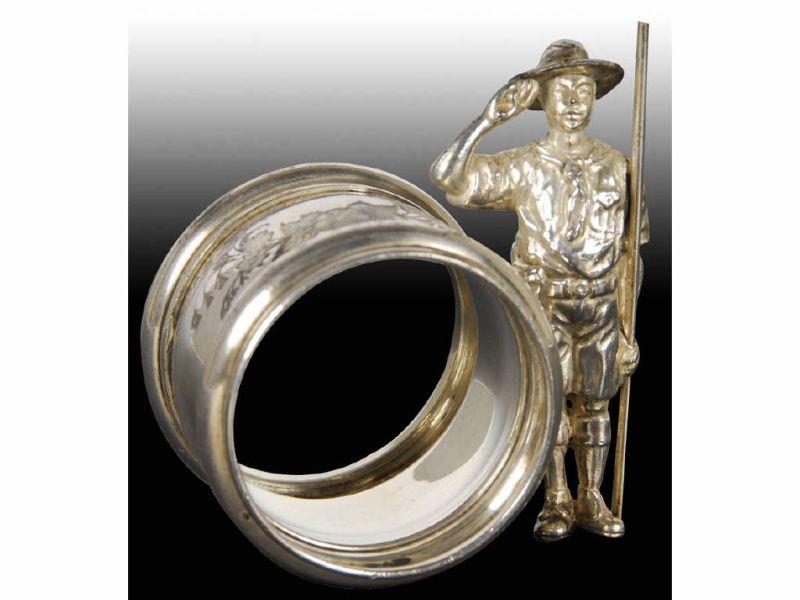 Appraisal: Saluting Boy Scout with Staff Figural Napkin Ring Description No