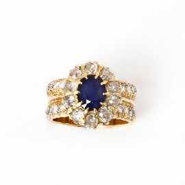 Appraisal: An ct gold estimated ct oval sapphire and ten diamond