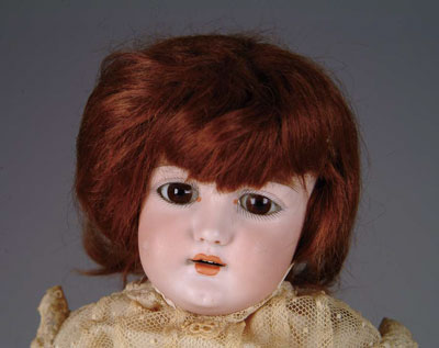 Appraisal: SIMON HALBIG DOLL An unusual number this brown glass eyed