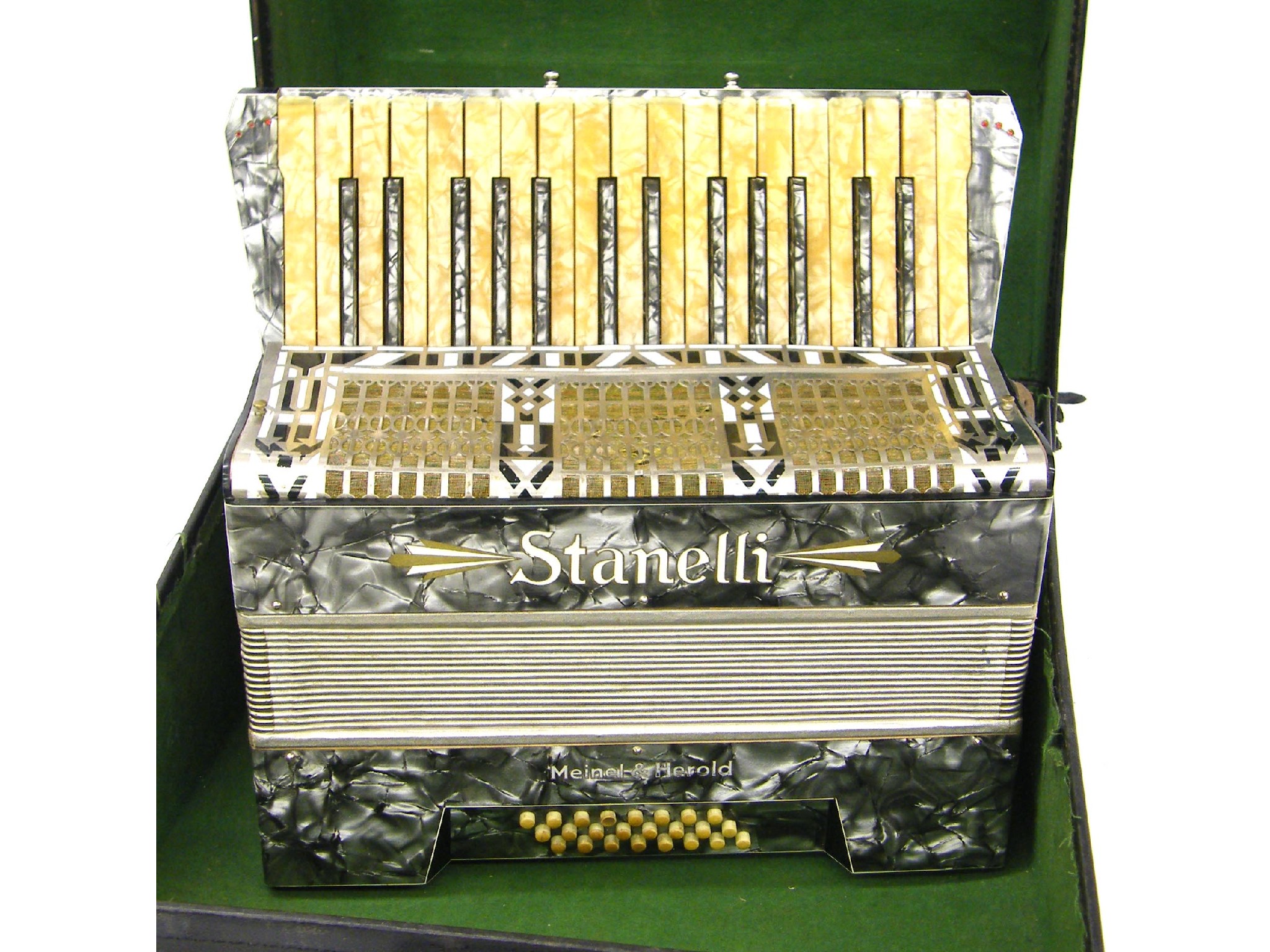 Appraisal: Meinel Herold Stanelli twenty-four button piano accordion with grey pearloid