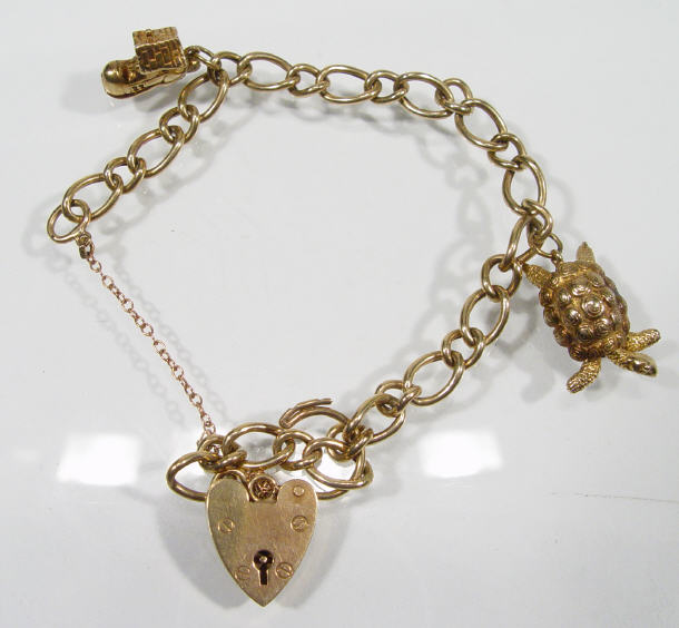 Appraisal: ct gold charm bracelet with boot and articulate tortoise