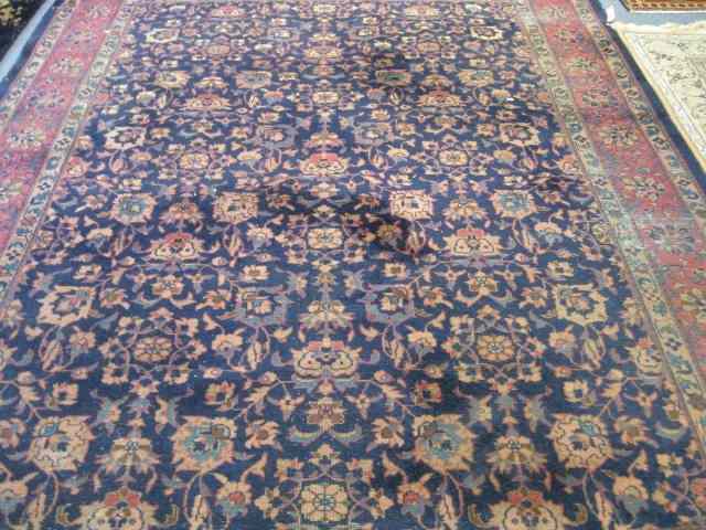 Appraisal: Lilihan Style Persian Room Size Rug semi-antique floral on blue