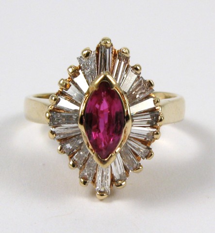 Appraisal: PINK SAPPHIRE AND DIAMOND RING k yellow gold centering a